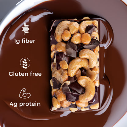Top view: Salted Caramel Dark Chocolate ToYou Snack bar (unwrapped). Right side icons: (1g Fiber, Gluten free, 4g Protein) on a puddle of melted dark chocolate.